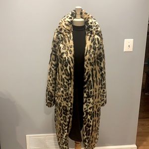 Free people long faux fur Leopard coat.